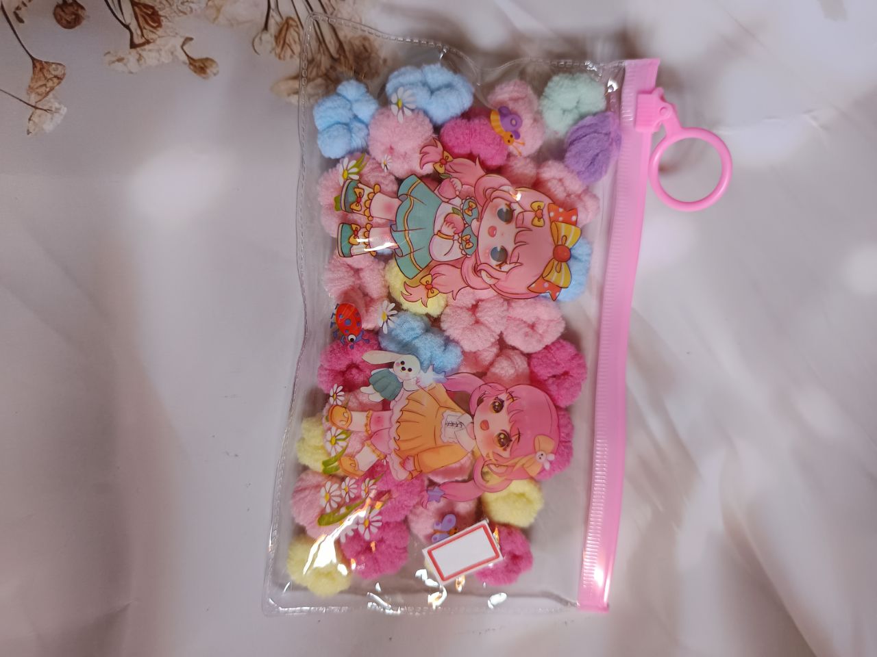 Fluffy hairties pouch