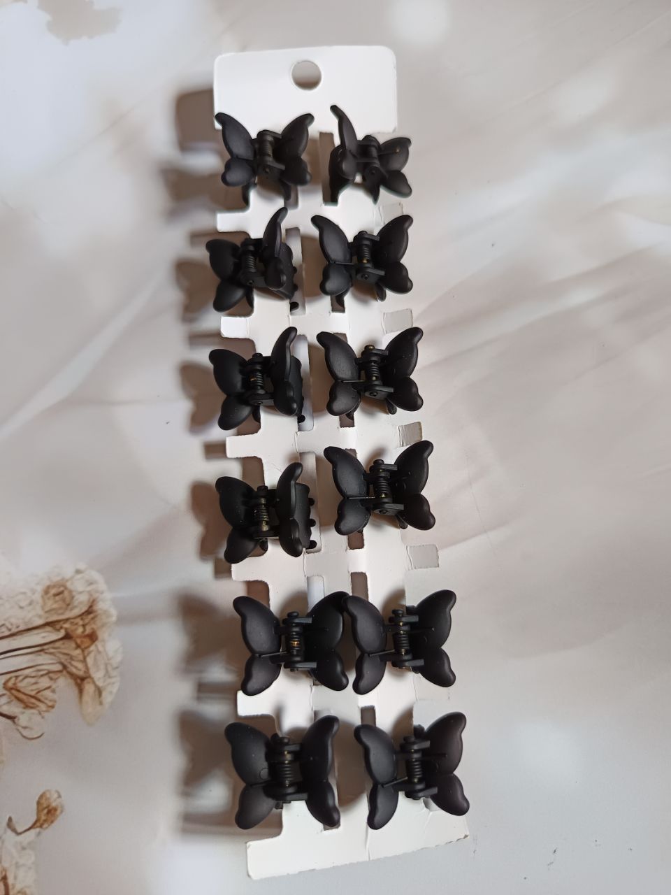 Super soft matte black butterfly claw