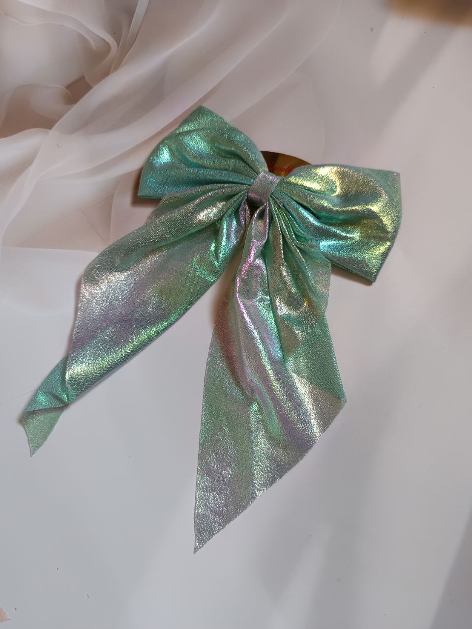 Shimmering barbie tail bow clip