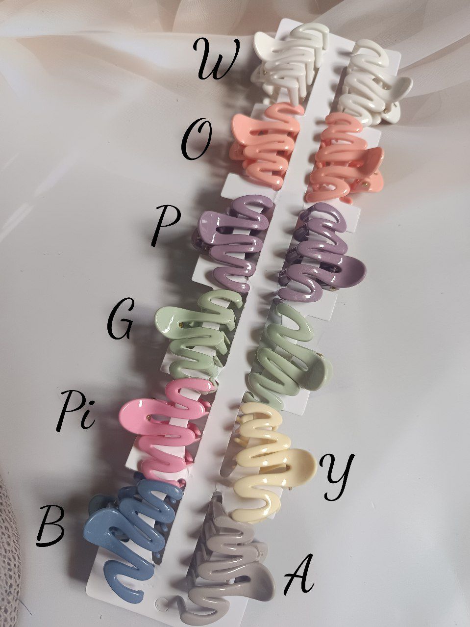 Glossy plastic Wave claw