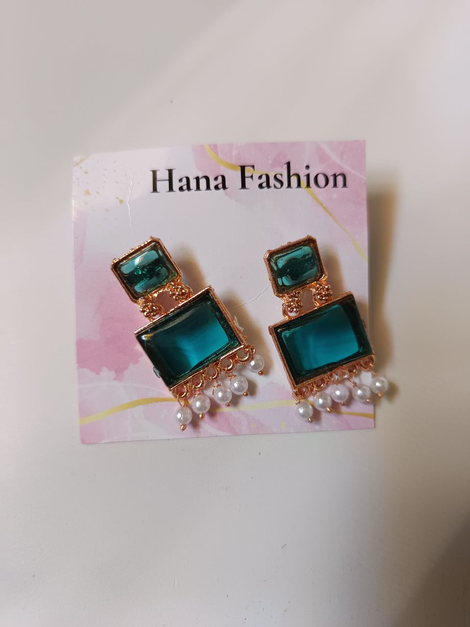 Emerald charm drops
