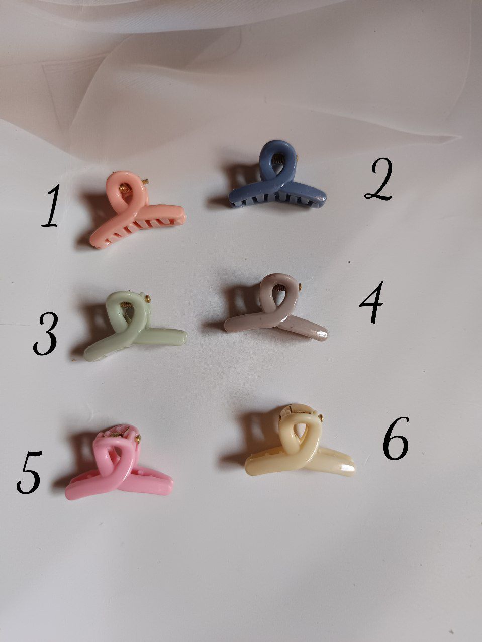 Mini twisted loop claw
