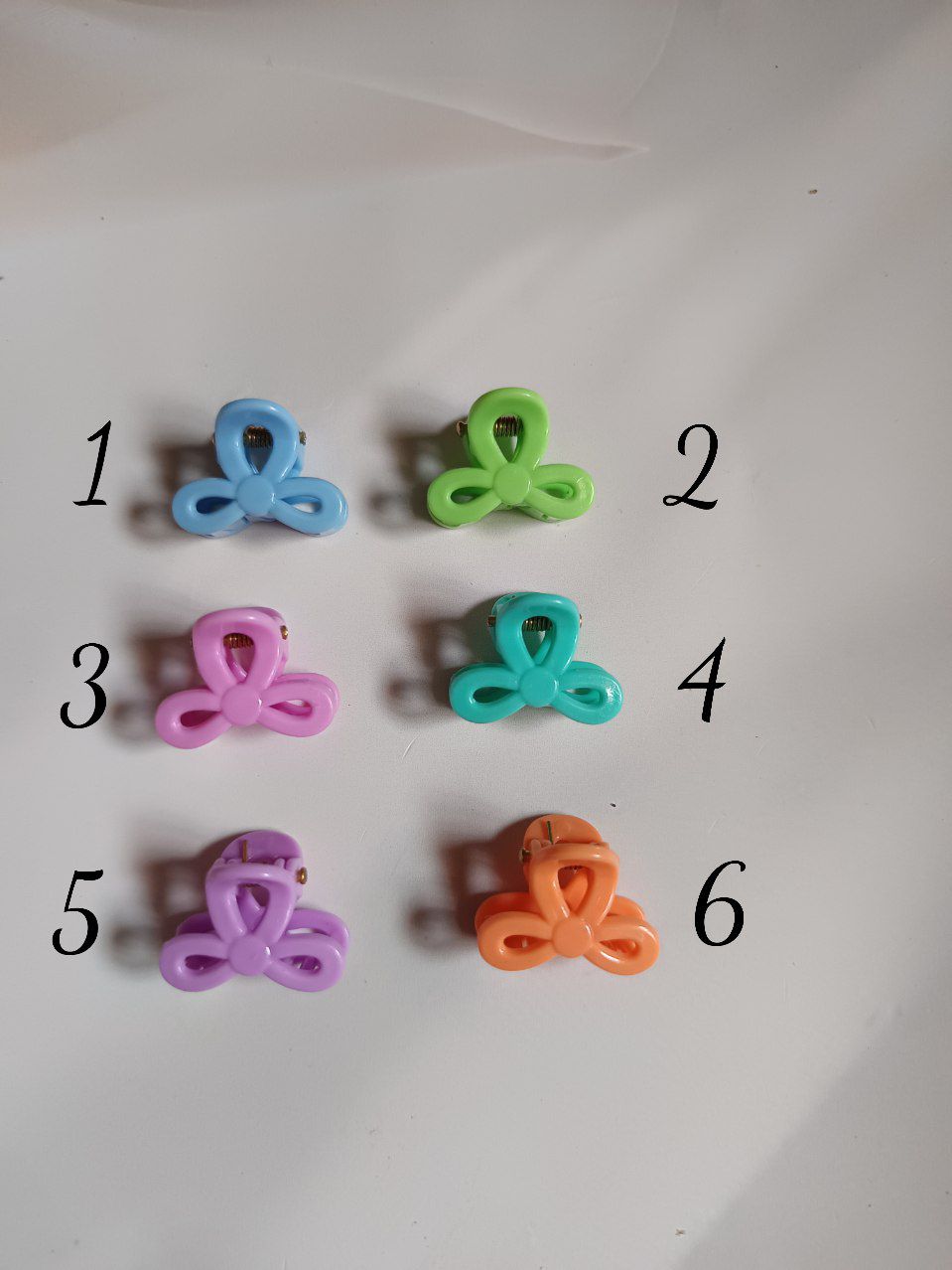 Mini clover loop claw