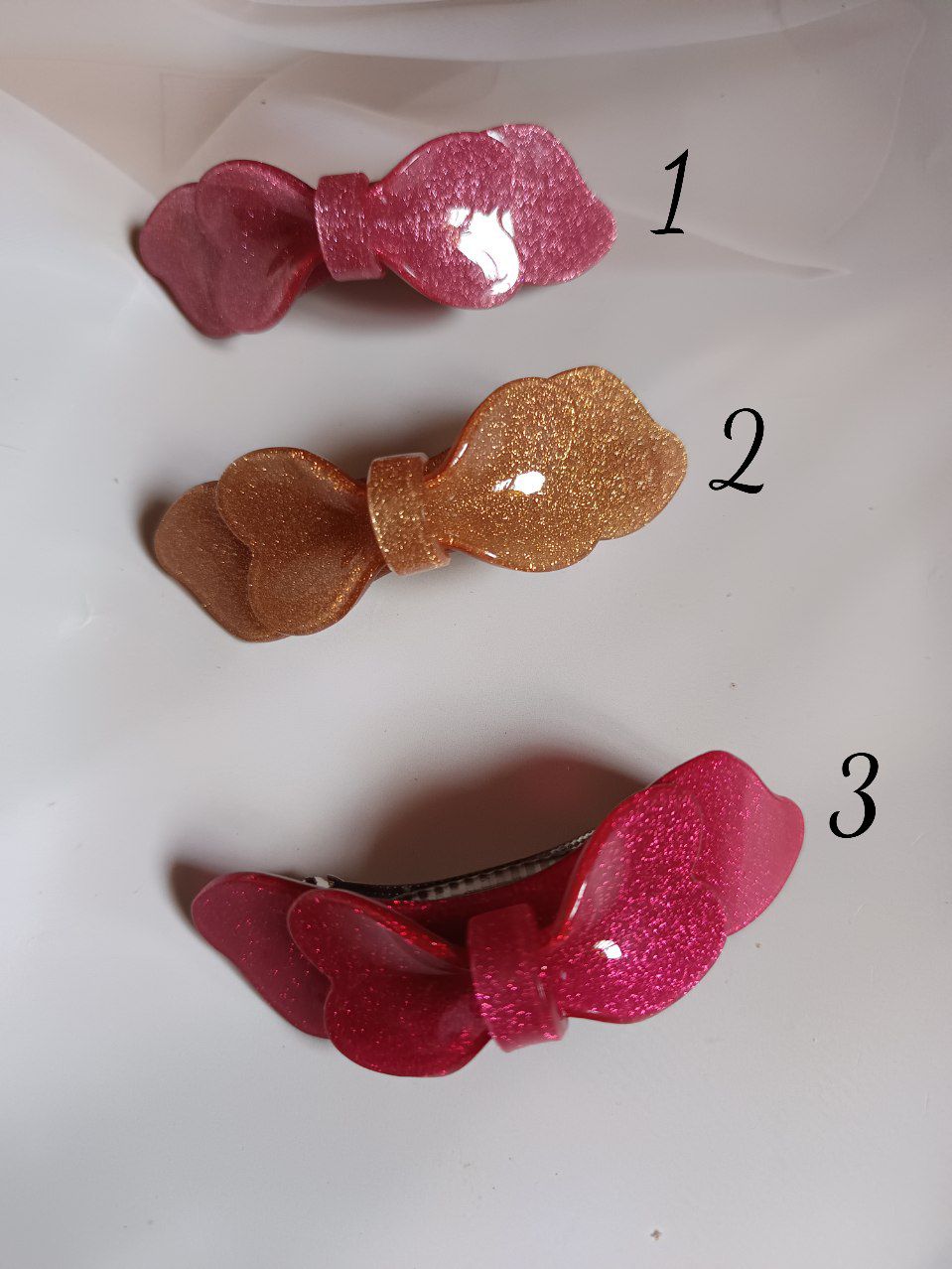Shimmering bow centerclip imported